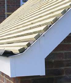 Eaves end and bargeboard on part-hipped roof